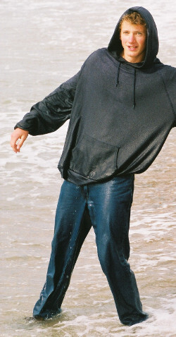 hoodie blue jeans swimming fully clothed on beach